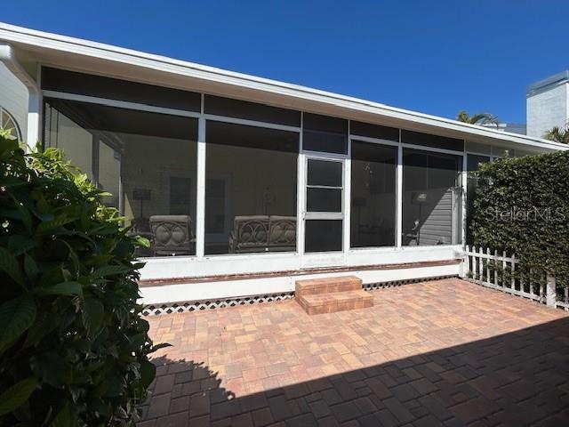 exterior space with a sunroom