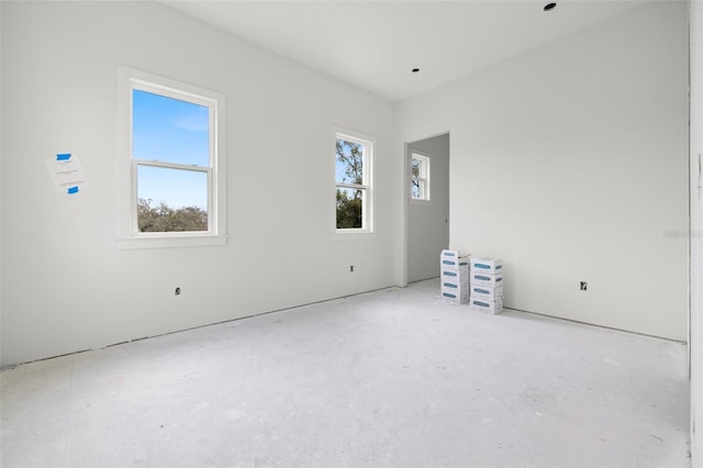 unfurnished room featuring a wealth of natural light