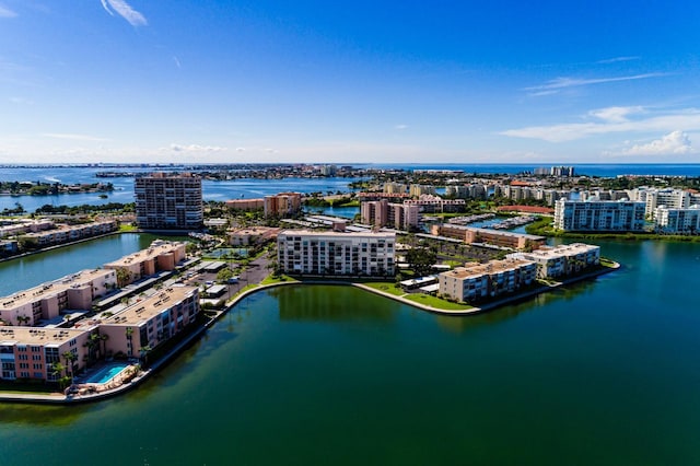 aerial view featuring a water view and a view of city