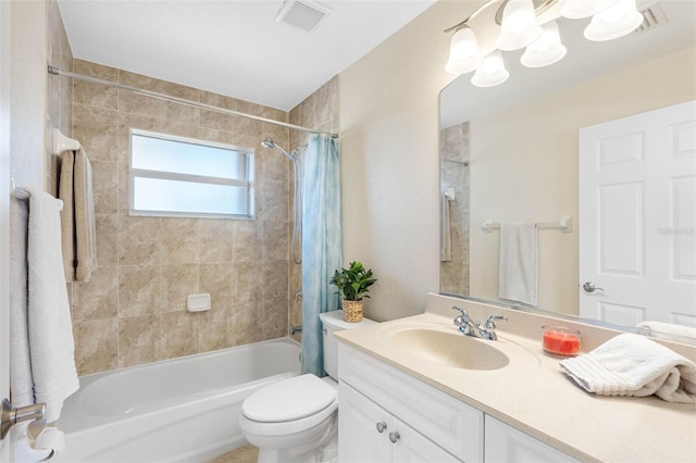 full bath featuring shower / bath combo, visible vents, vanity, and toilet