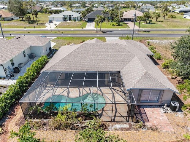 birds eye view of property with a residential view