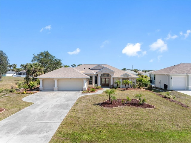 ranch-style house with a garage, concrete driveway, a front yard, and stucco siding