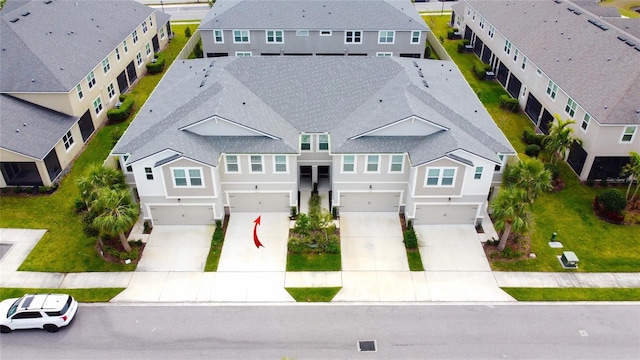 drone / aerial view with a residential view