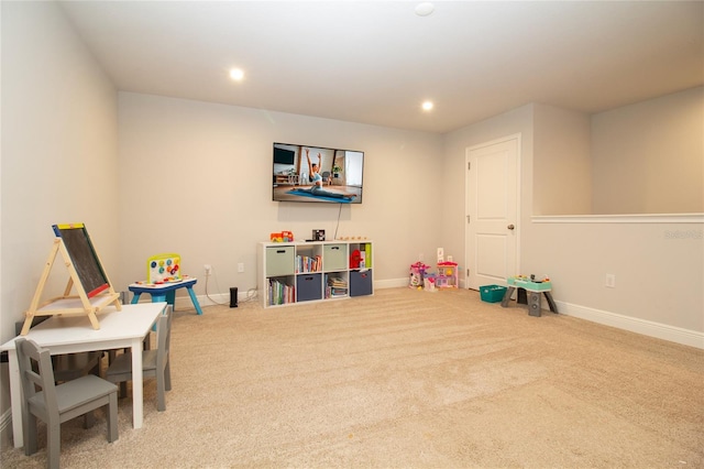 recreation room featuring baseboards, carpet, and recessed lighting