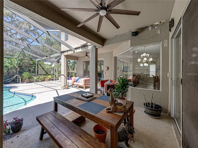 view of patio with ceiling fan, a lanai, an outdoor living space, and an outdoor pool