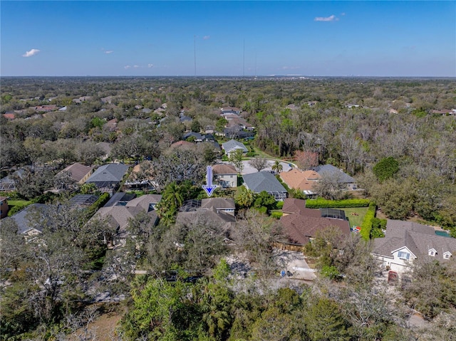 birds eye view of property with a residential view