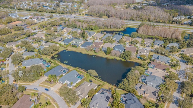 aerial view featuring a water view and a residential view