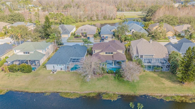 aerial view with a water view and a residential view