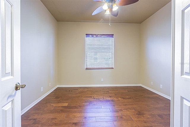 unfurnished room with a wealth of natural light, ceiling fan, and wood finished floors