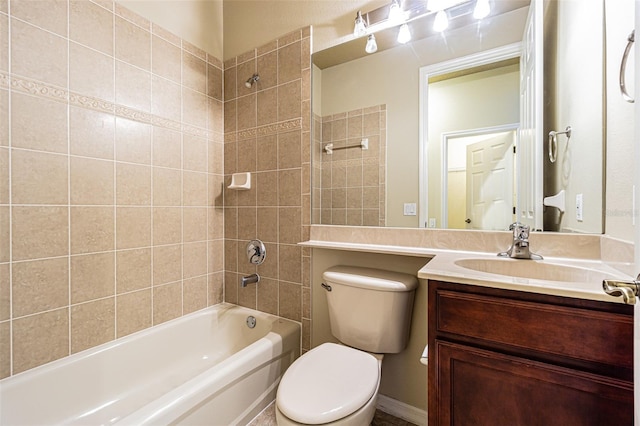 full bath with toilet, vanity, and bathing tub / shower combination