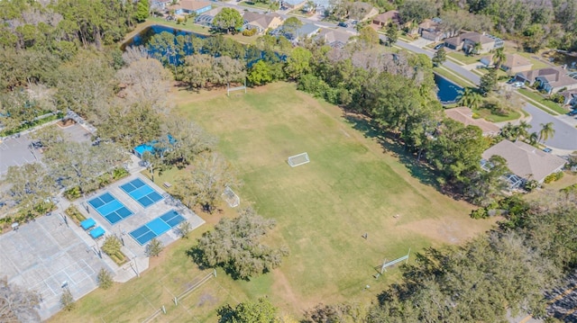 aerial view with a water view and a residential view