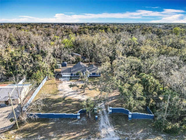 drone / aerial view with a forest view