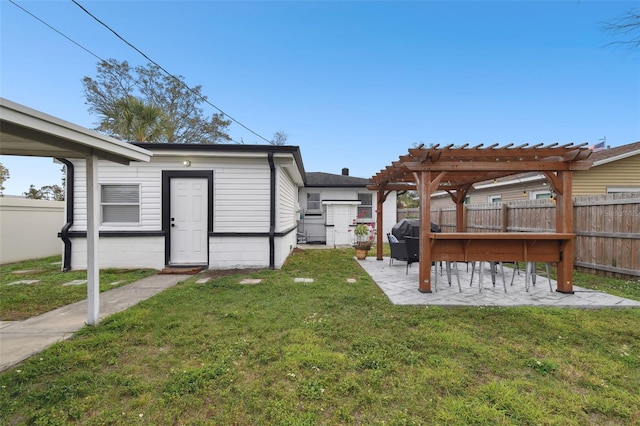 view of yard with a patio, fence, and a pergola