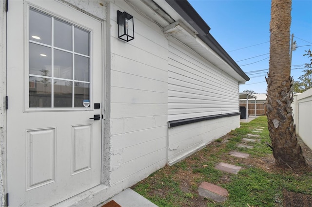 property entrance with fence