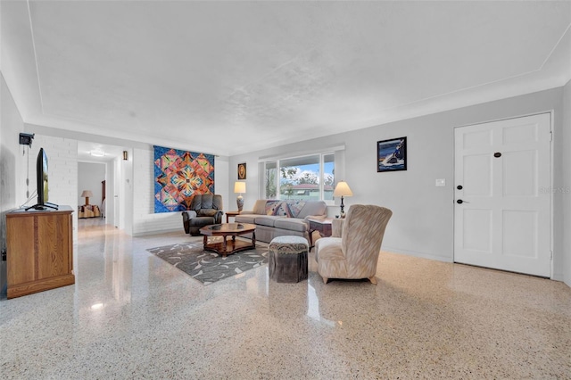 living room featuring speckled floor