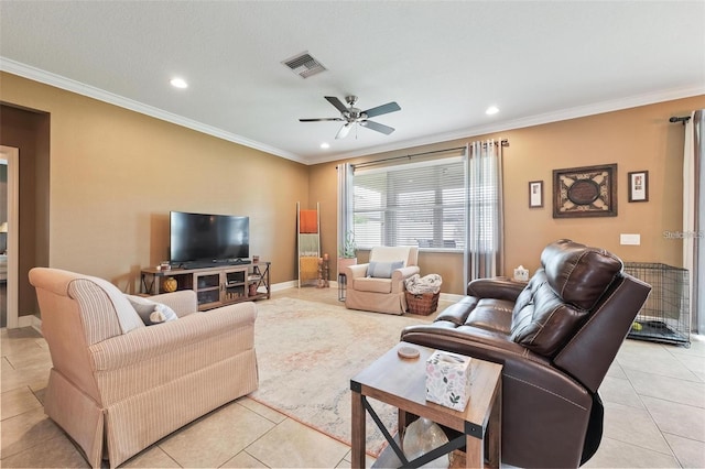 living room featuring ornamental molding, visible vents, baseboards, and light tile patterned floors