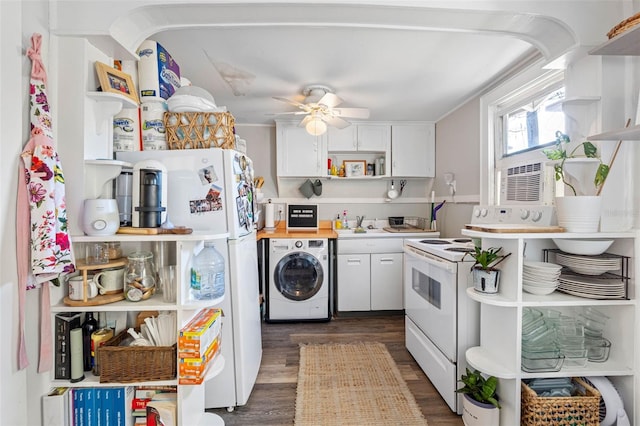 kitchen featuring dark wood-type flooring, open shelves, white appliances, white cabinets, and washer / dryer