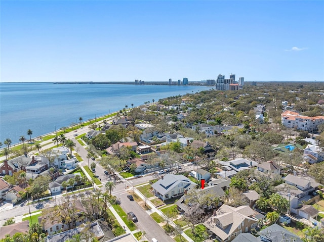 birds eye view of property featuring a residential view and a water view