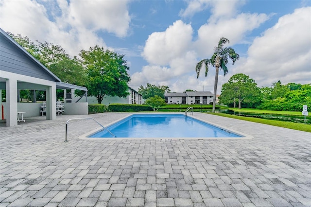 pool featuring a patio area