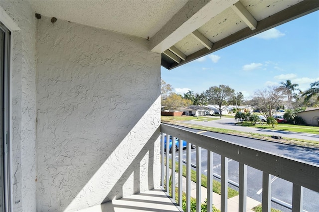 balcony featuring a residential view