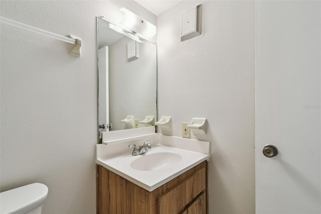 half bath with toilet and vanity