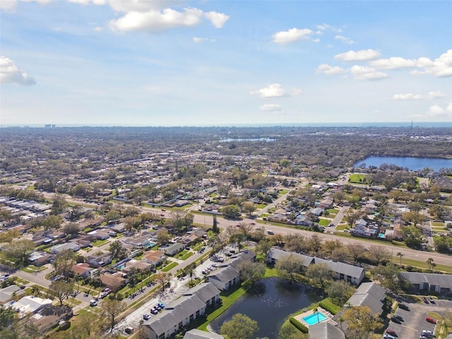 aerial view with a water view and a residential view