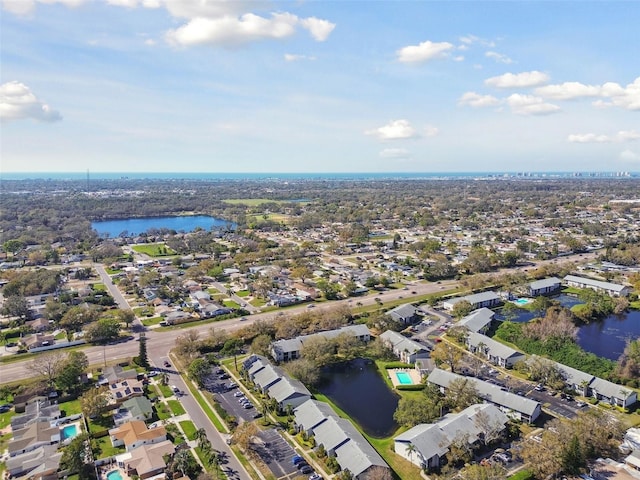 bird's eye view with a water view and a residential view