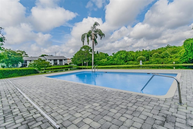 pool featuring a patio area