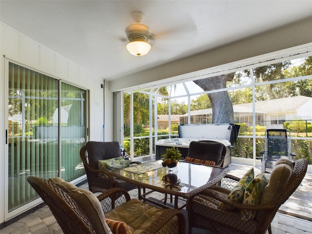 sunroom / solarium with ceiling fan