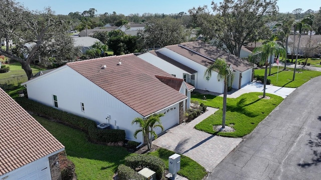 birds eye view of property with a residential view