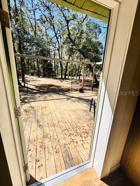 doorway to outside featuring hardwood / wood-style floors