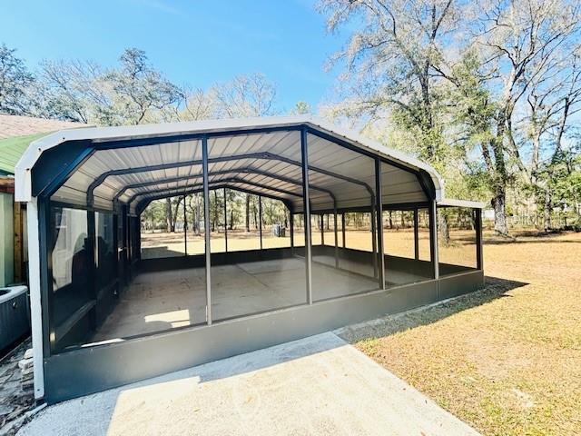 view of car parking featuring a detached carport