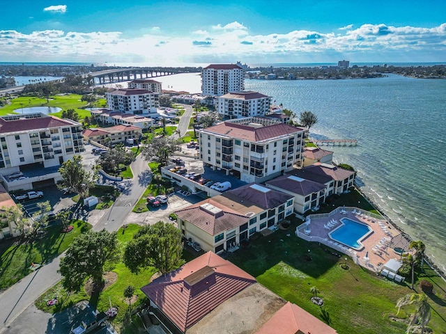 bird's eye view featuring a water view and a city view