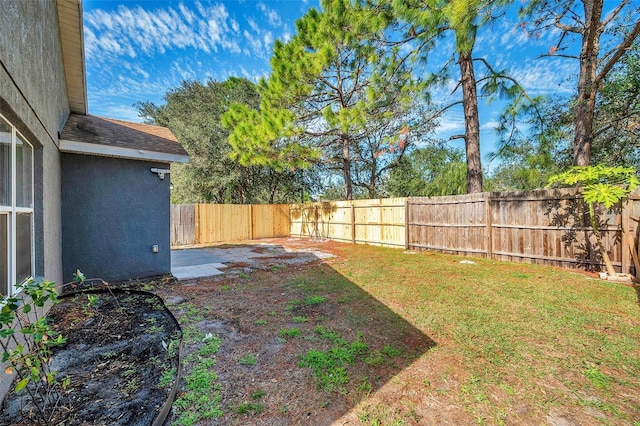 view of yard featuring a fenced backyard