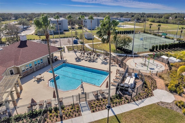 view of pool featuring fence