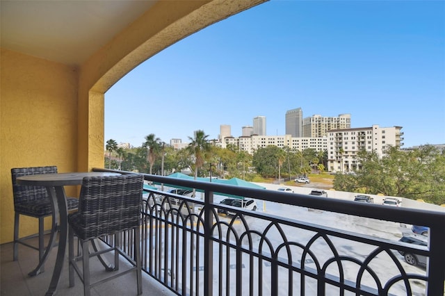 balcony featuring a city view