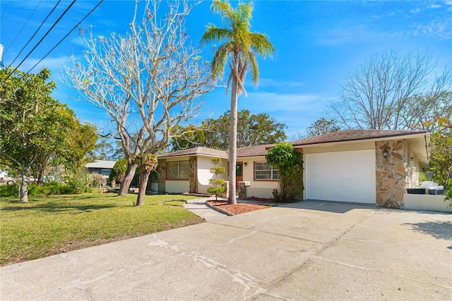 ranch-style house with an attached garage, driveway, a front lawn, and stucco siding