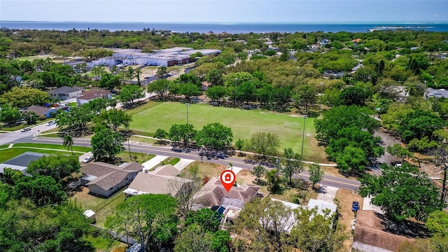 bird's eye view with a residential view and a water view