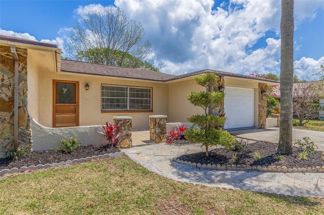 ranch-style home featuring stucco siding, driveway, and a garage