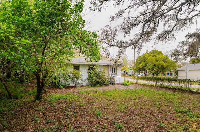 view of yard with fence