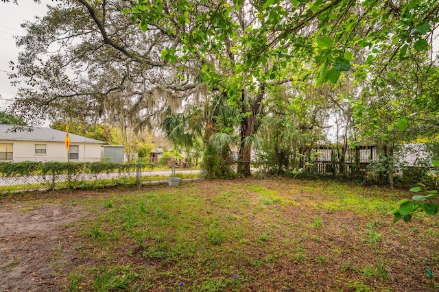 view of yard with fence