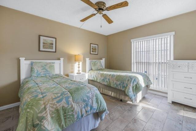 bedroom featuring a ceiling fan
