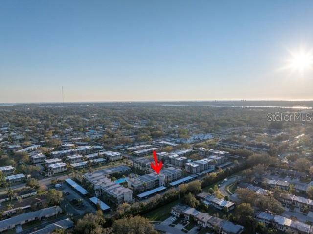 birds eye view of property featuring a city view