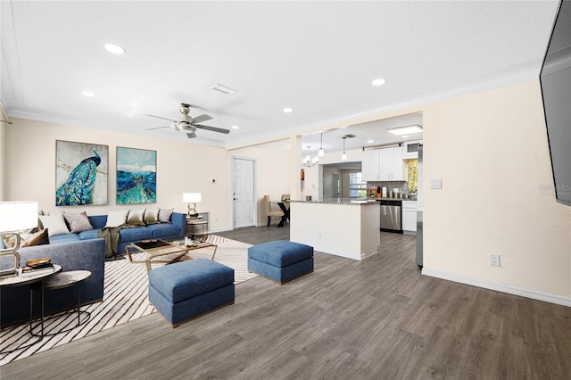 1131 60th Ave S, Saint Petersburg, FL 33705 - living area with dark wood finished floors, baseboards, a ceiling fan, and recessed lighting