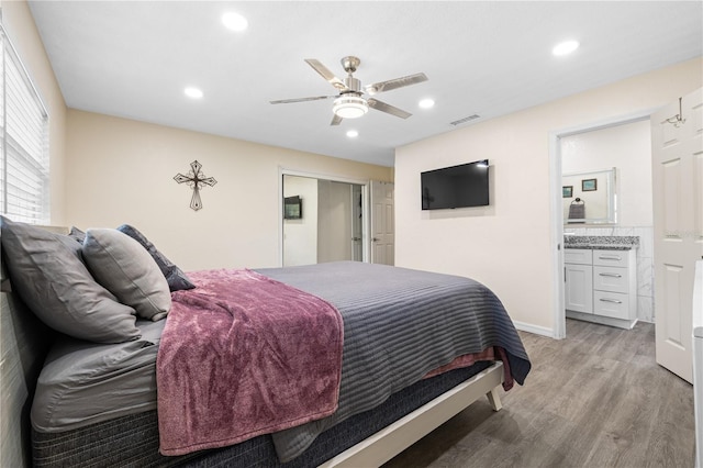 1131 60th Ave S, Saint Petersburg, FL 33705 - bedroom featuring light wood-style flooring, recessed lighting, ensuite bath, a ceiling fan, and baseboards