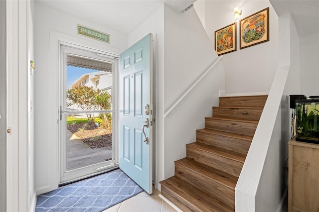 foyer entrance featuring stairs