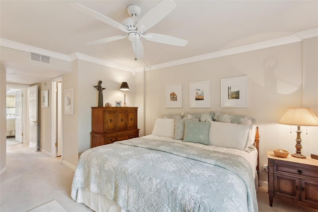 bedroom featuring baseboards, visible vents, light colored carpet, ceiling fan, and ornamental molding