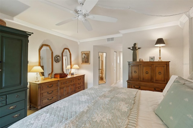 bedroom featuring ornamental molding, visible vents, and a ceiling fan