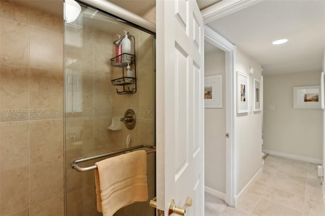 full bathroom with recessed lighting, tile patterned flooring, a shower stall, and baseboards