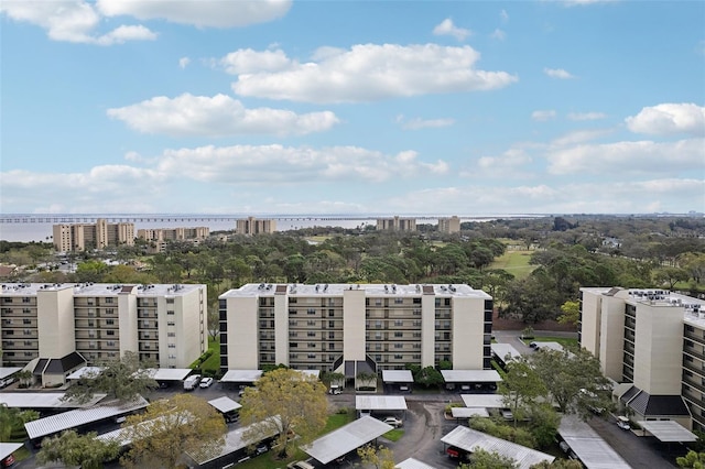 birds eye view of property with a view of city